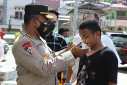 Papua’s police officers launch mask-wearing campaign in Jayapura City